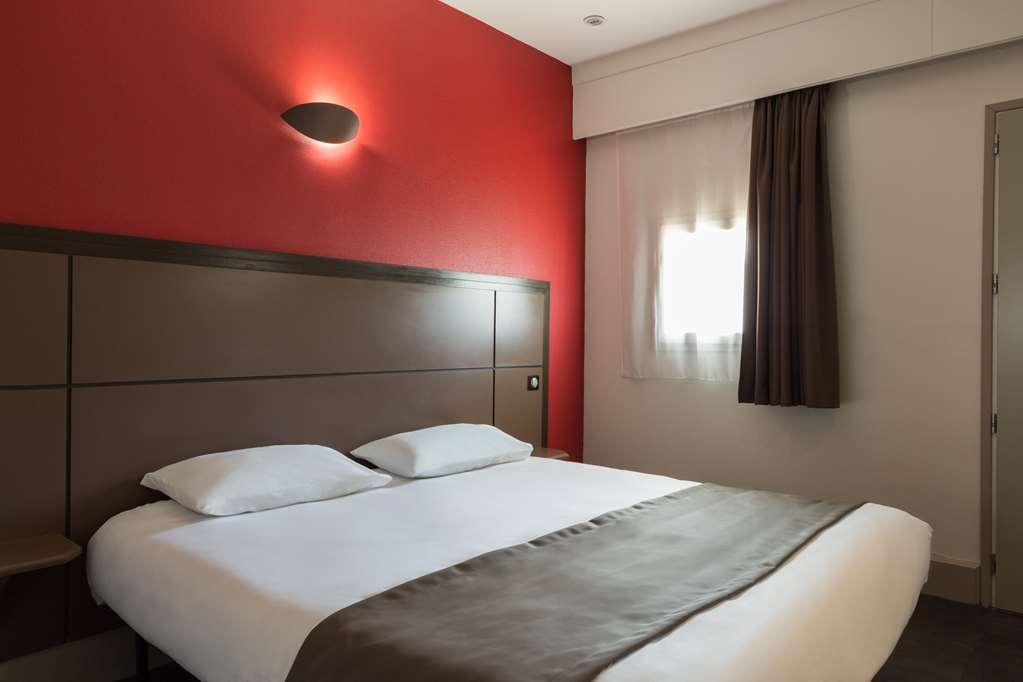 Hotel Confort Le Moulin Rouge Terrasson Zimmer foto